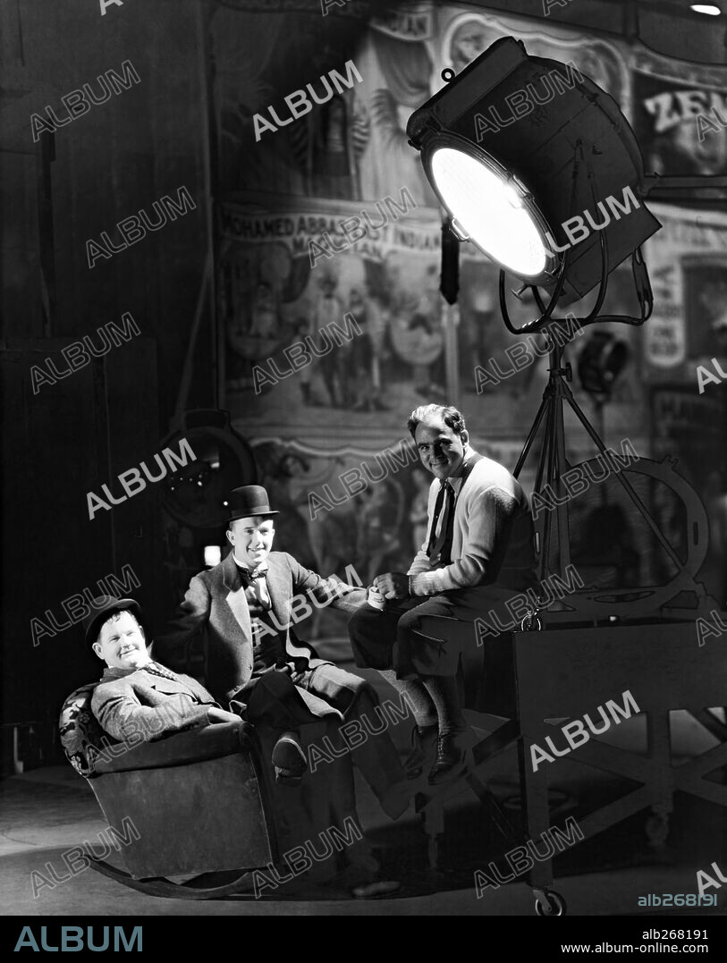 HAL ROACH, OLIVER HARDY and STAN LAUREL.