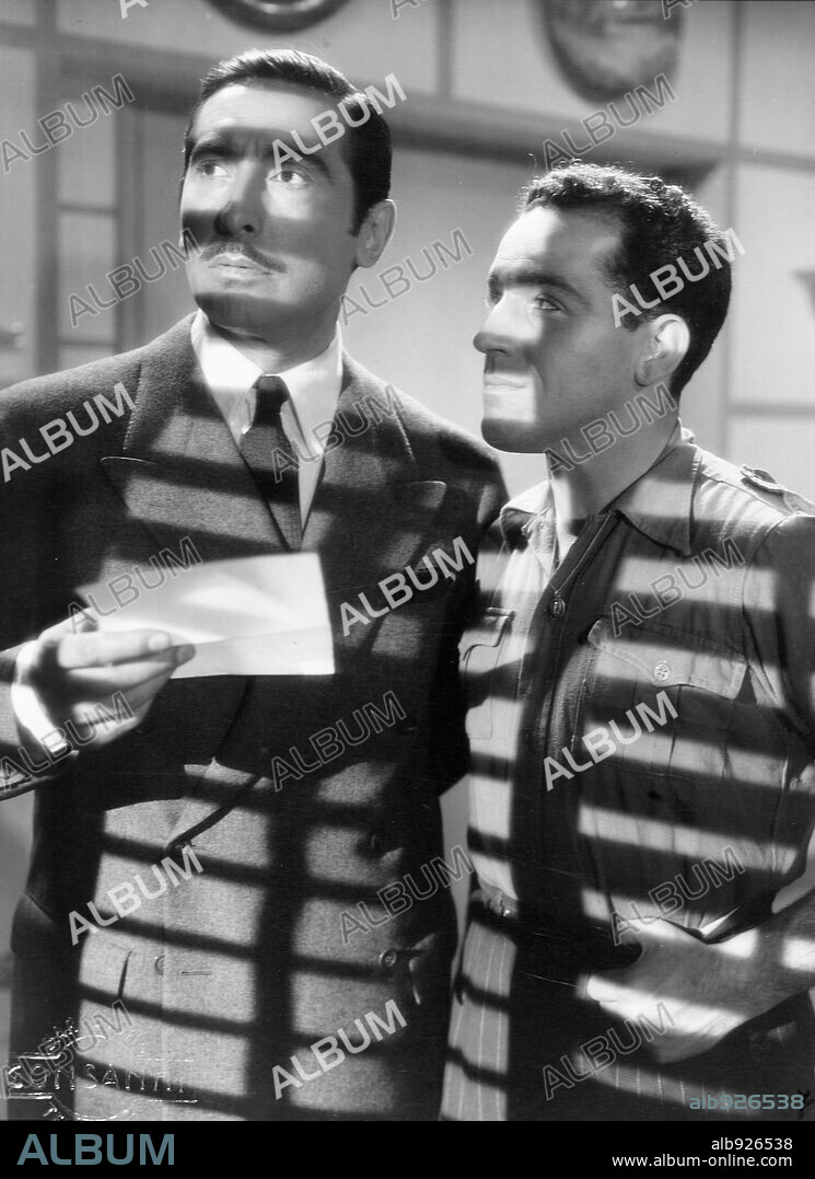 ANGEL DE ANDRES and JOSE NIETO in CABEZA DE HIERRO, 1944, directed by IGNACIO F. IQUINO. Copyright EMISORA FILMS.