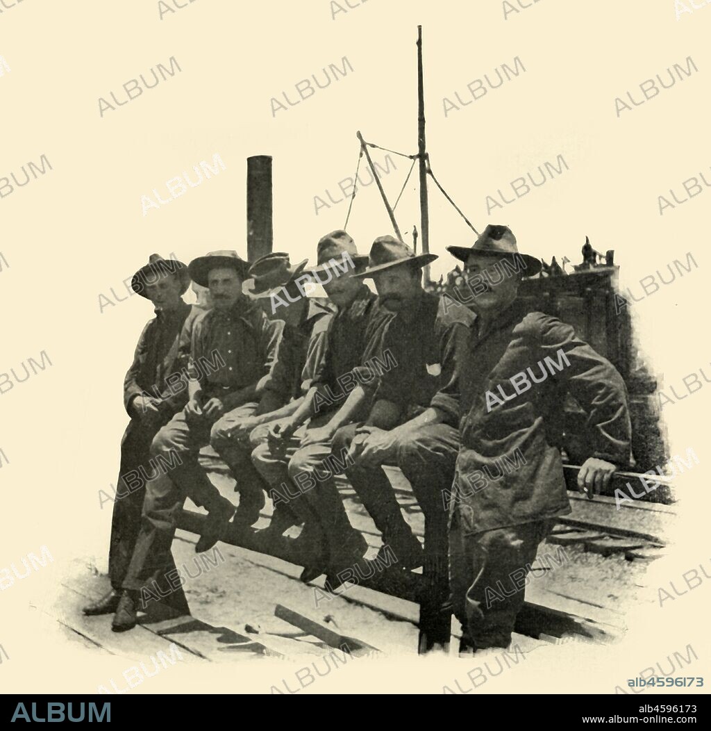 'Rough Riders', Spanish-American War, 12 June 1898, (1899). Soldiers of the 1st United States Volunteer Cavalry, known as the Rough Riders, preparing to leave for Cuba from Port Tampa, Florida, USA. From "The Little I saw of Cuba" by Burr McIntosh, with photographs by the author. (In 1898, American actor and journalist William Burr McIntosh went to Cuba to cover the Spanish-American War for "Leslie's Weekly" as a reporter and photographer). [F. Tennyson Neely, London & New York, 1899].