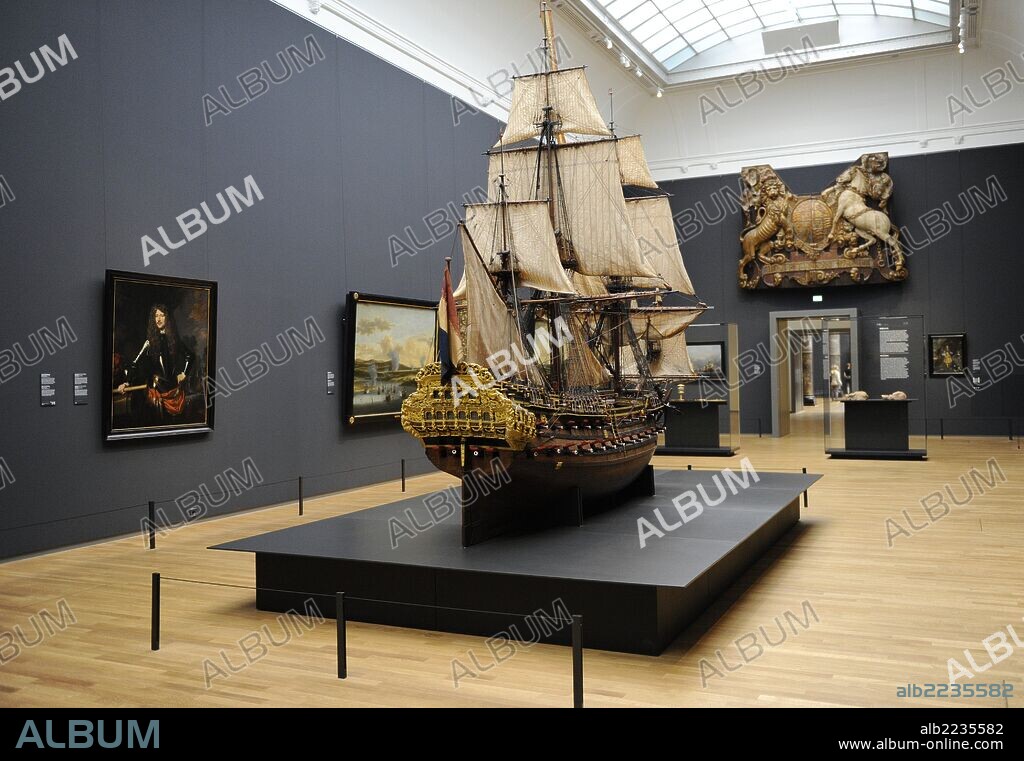 Holland. Amsterdam. Rijksmuseum. Interior of a room with model of the William Rex warship. Cornelis Moesman, Adriaen de Vriend, 1698.