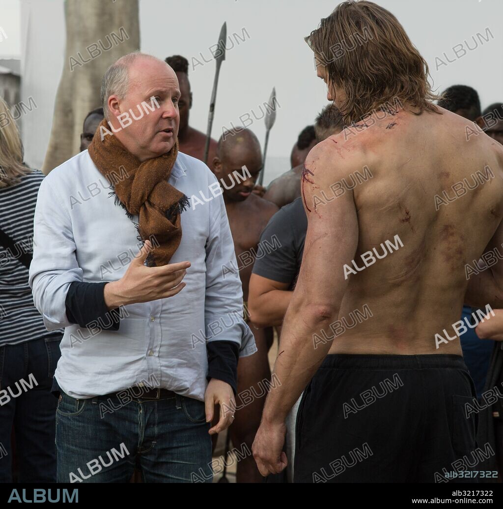 ALEXANDER SKARSGARD and DAVID YATES in THE LEGEND OF TARZAN, 2016, directed by DAVID YATES. Copyright Dark Horse Entertainment/Jerry Weintreub prod/Riche Prod/Vil / OLLEY, JONATHAN.