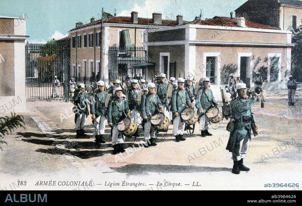 Marching band, French Foreign Legion, c1910. French postcard.