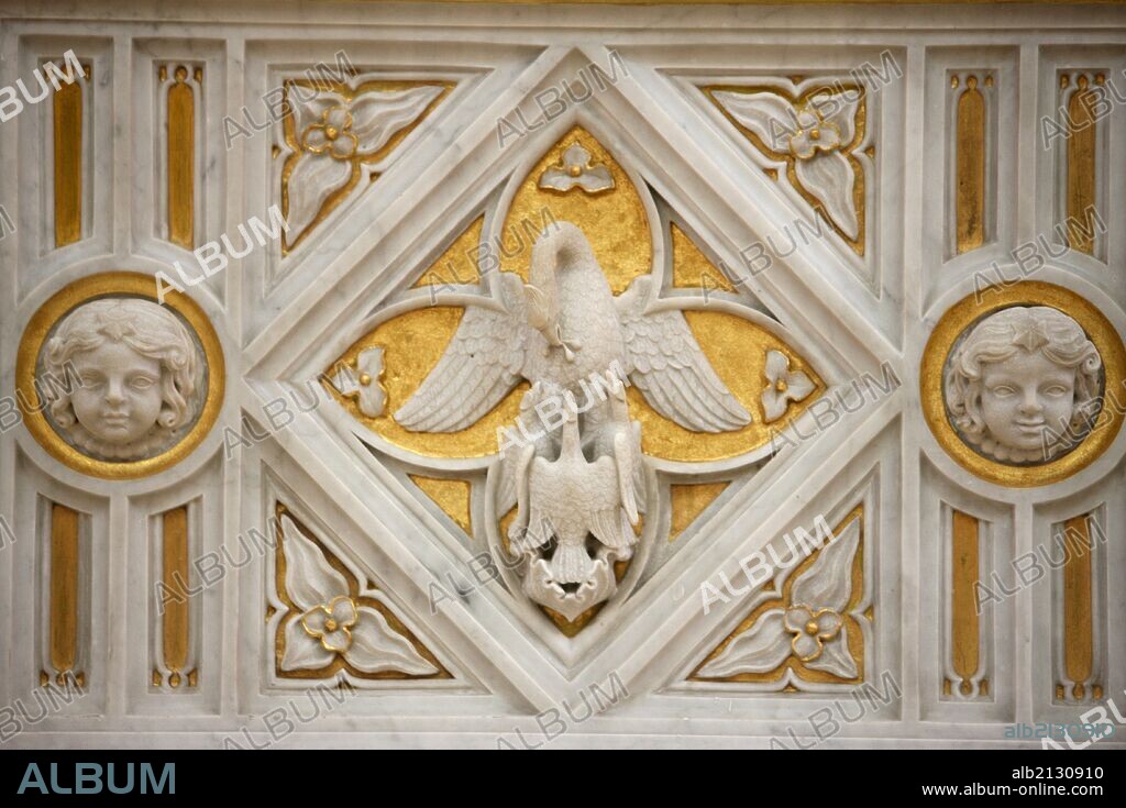 Pelican sculpture in Notre-Dame of Dat´le collegiate church.
