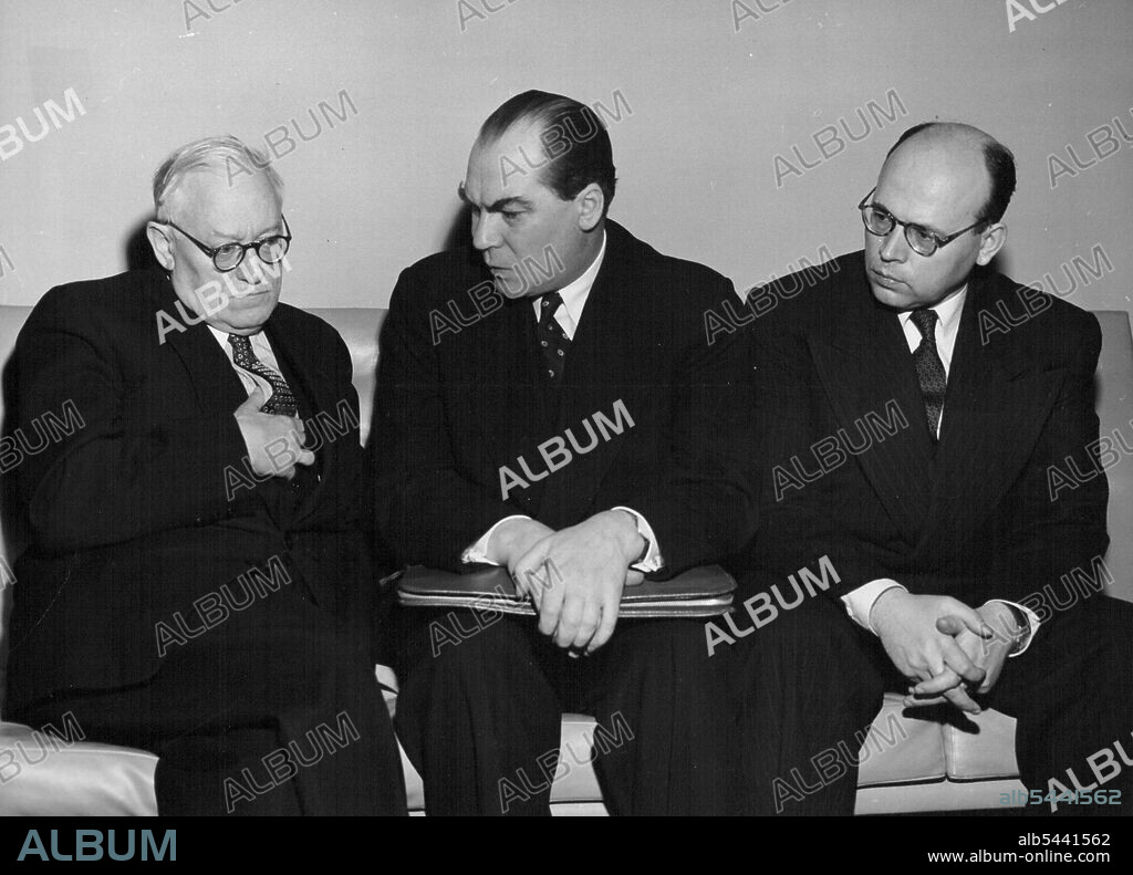 Soviet Representatives Mourn Premier Stalin -- This picture, taken in a lounge at U.N. Headquarters on 6 March 1953 - the day after the death of Premier Stalin of the Soviet Union - shows, from left to right: Mr. Andrei Y. Vyshinsky, Minister for Foreign Affairs of U.S.S.R.; Mr. Georgi N. Zarubin, Soviet Ambassador to the United States; and Mr. Aleksander A. Soldatov, member of the U.S.S.R. delegation to the current session of the Assembly. March 6, 1953. (Photo by United Nations).