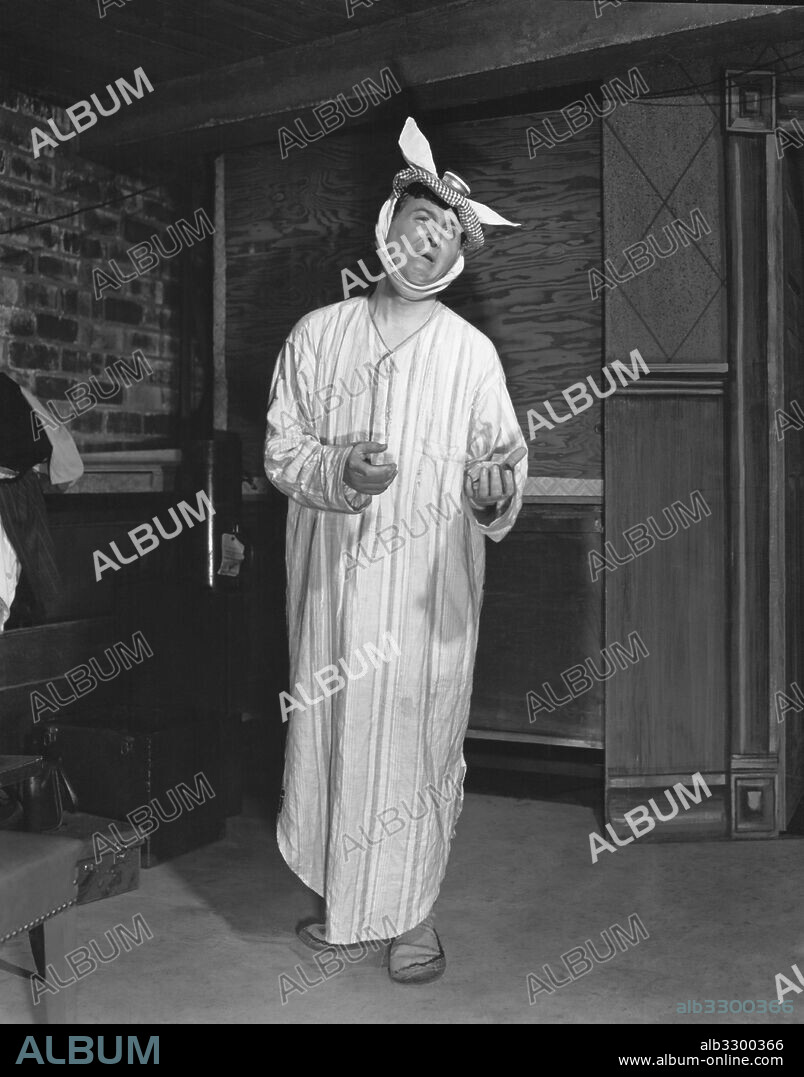 Los Angeles, California:    1951.Actor Eddie Bracken in pain in the Preston Sturges presentation of "Room Service" at the Players Theater.