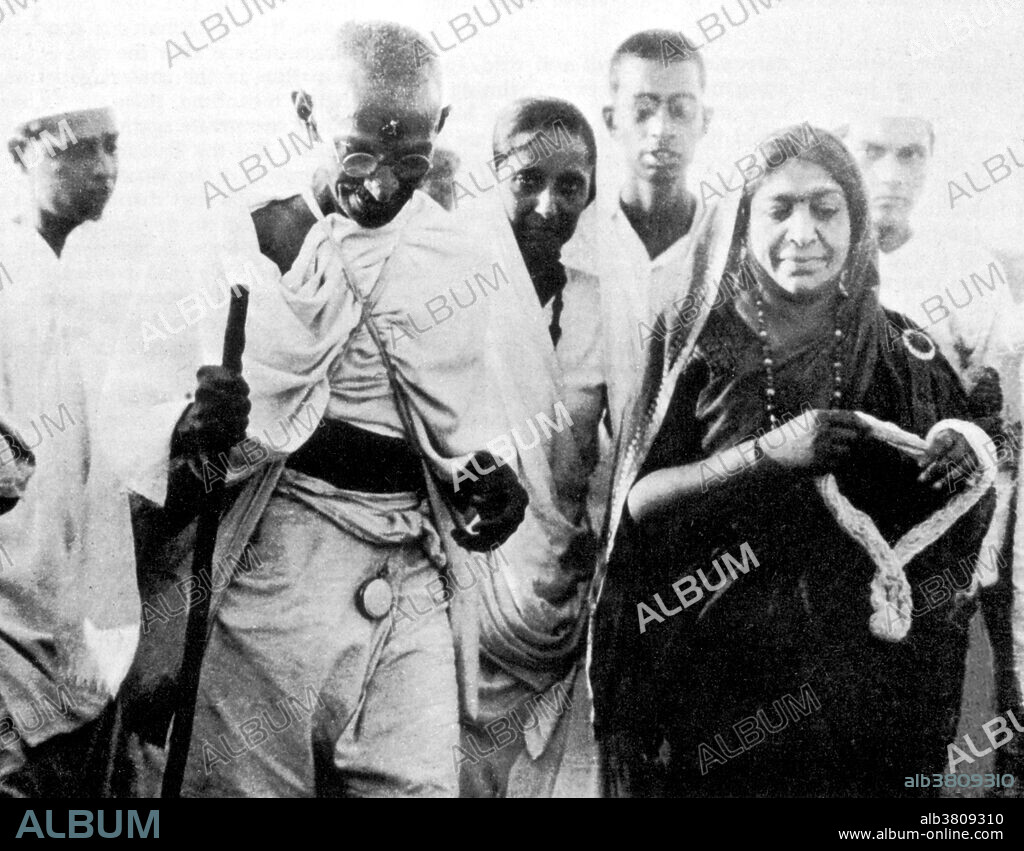 The Salt March was initiated by Mohandas Gandhi to illegally produce salt from seawater. It began on March 12, 1930, and was a direct action campaign of tax resistance and nonviolent protest against the British salt monopoly in colonial India. Mohandas Karamchand Gandhi (October 2, 1869 - January 30, 1948) was the pre-eminent political and ideological leader of India during the Indian independence movement. Pioneering the use of non-violent resistance to tyranny through mass civil disobedience, a tool to fight for civil rights and freedom that he called satyagraha, he founded his doctrine of nonviolent protest to achieve political and social progress based upon ahimsa, or total nonviolence for which he is internationally renowned. He led nationwide campaigns for easing poverty, expanding women's rights, building religious and ethnic amity, ending untouchability, increasing economic self-reliance, but above all for achieving Swaraj, the independence of India from foreign domination. Gandhi was assassinated on January 30th, 1948, by Nathuram Godse, a Hindu nationalist who felt Gandhi was sympathetic to the Muslims. No photographer credited, 1930.
