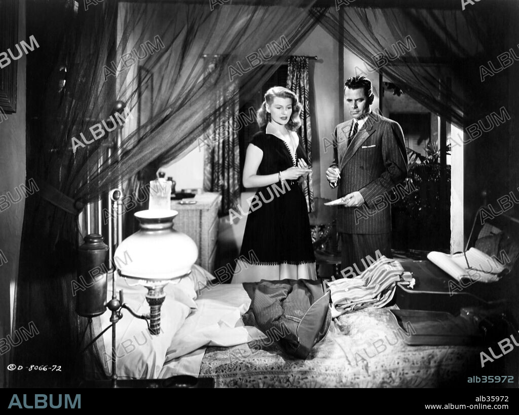 GLENN FORD and RITA HAYWORTH in AFFAIR IN TRINIDAD, 1952, directed by VINCENT SHERMAN. Copyright COLUMBIA PICTURES.