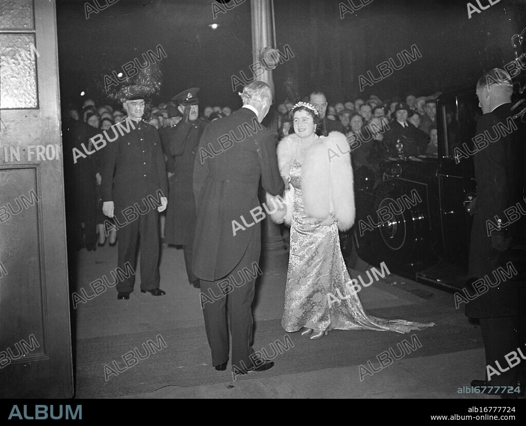 Queen attends charity performance at the Old Vic. The Queen attended a special performance of 'Macbeth'at the Old Vic in Waterloo Road, in aid of the Centenary Fund of the Kings College Hospital. She has a special interest in the Shakespearean tragedy, scene of which is set at Glamis, her ancestral home. Photo shows, the Queen being received by Lord Lytton when she arrived at the Old Vic. 29 November 1937.