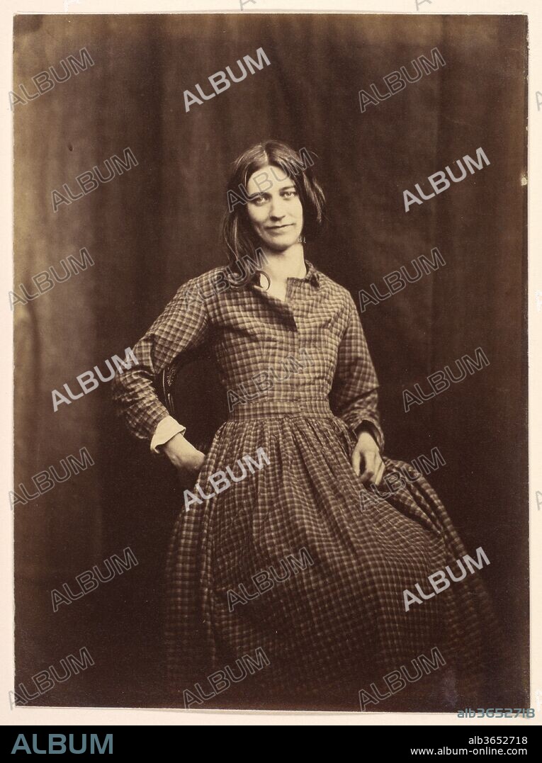 Patient, Surrey County Lunatic Asylum. Artist: Hugh Welch Diamond (British, 1808-1886). Dimensions: Mat: 11 1/4 × 9 1/8 in. (28.6 × 23.2 cm)
Image: 7 1/2 × 5 1/2 in. (19.1 × 14 cm). Date: 1850-58.
A medical doctor, antiquarian, and collector of prints, Hugh Diamond is a prime example of a gentleman amateur who furthered the development of the new medium of photography. He made his first photograph in April 1839, only three months after Talbot's demonstration of the invention, was instrumental in founding the Photographic Society in 1853, and through publications and informal gatherings taught many photographers, including Henry Peach Robinson, to use both the calotype and the collodion processes.
Following Sir Alexander Morison as the superintendent of the Surrey County Lunatic Asylum, from 1848 to 1858 Diamond updated--with photographs--his predecessor's atlas of engraved portraits of the patients. Working in the belief that mental states are manifested in the physiognomy and that photographs are objective representations of reality, Diamond described himself as a photographer as one who "catches in a moment the permanent cloud, or the passing storm or sunshine of the soul, and thus enables the metaphysician to witness and trace out the connexion between the visible and  the invisible." 
This photograph may have been made to identify the patient or, by recording a phase of the disease, to serve the doctor's diagnosis. Because the image is not annotated the viewer may, like the metaphysician, muse on whether the woman's engaging but ambiguous smile and almost cocky pose denote a state of madness, a return to health, or a challenge to society's parameters of sanity.