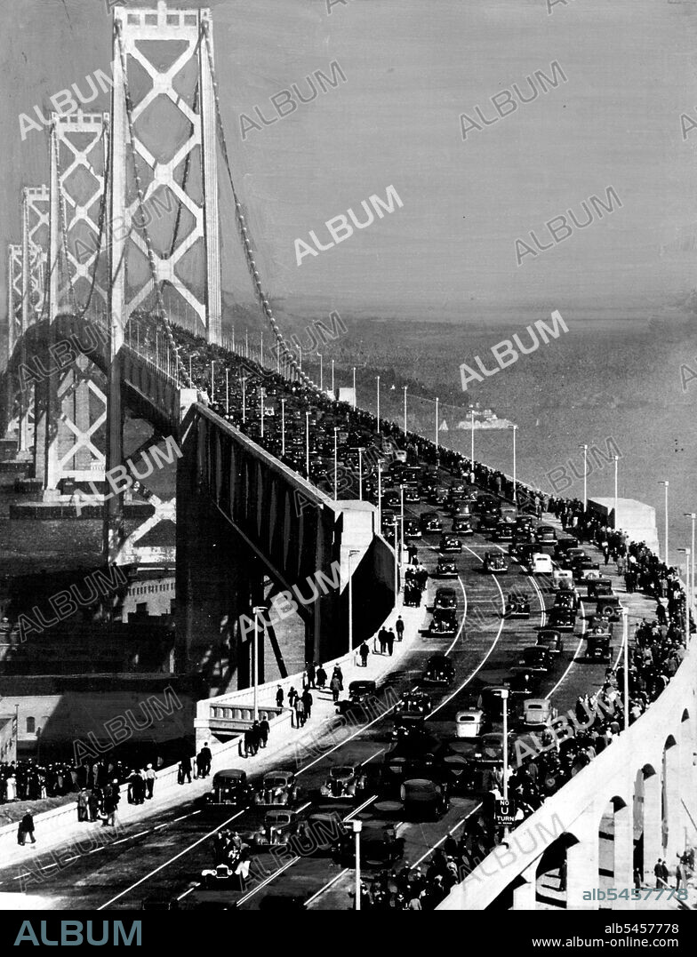 First Traffic On San Francisco - Oakland Bay Bridge -- A view of the San Francisco side of the world's largest bride shortly after it was opened to traffic for the first time on November 12th. President Roosevelt pressed a key in his office in Washington which officially opened the new bridge. November 14, 1936. (Photo by Wide World Photos).