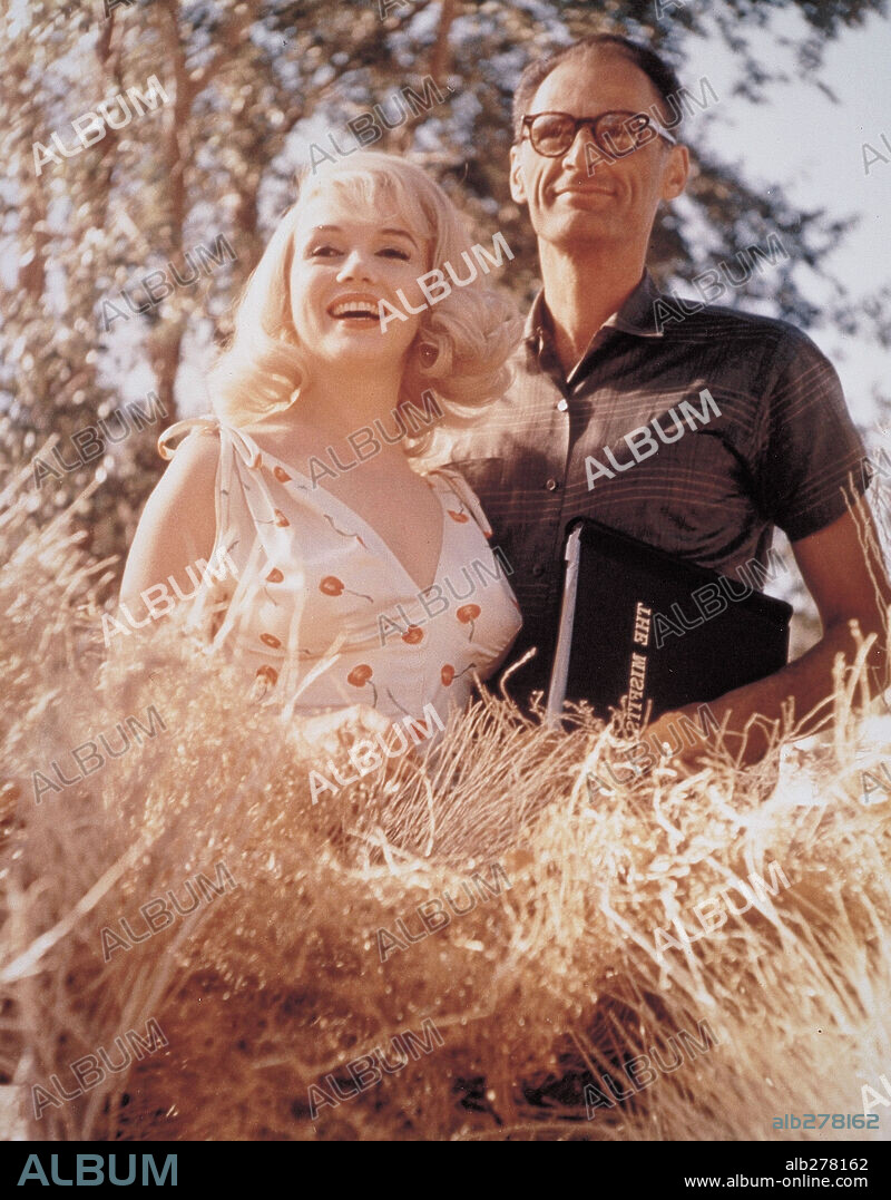 NORMA JEAN BAKER and MILLER ARTHUR 1915. ARTHUR MILLER and MARILYN MONROE in THE MISFITS, 1961, directed by JOHN HUSTON. Copyright UNITED ARTISTS/SEVEN ARTS.