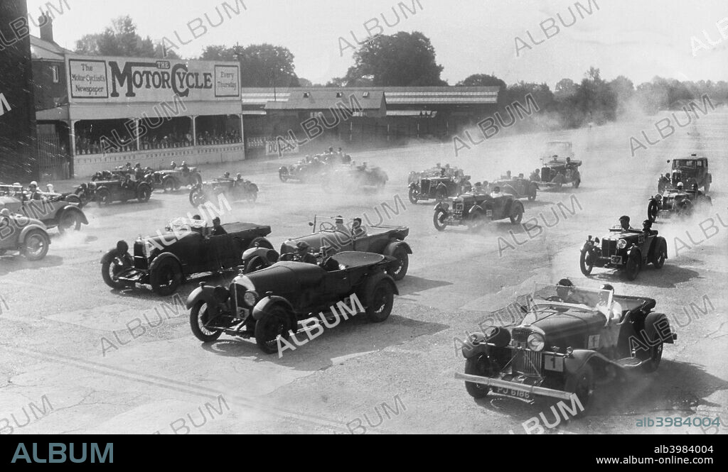 Talbot 105 Tourer 1932 2969 cc. Vehicle Reg. No.  PJ6168. Entry No: 1. Driver: Fowle, Lt.Cdr. R.G. Centre: Bentley 2996 cc.  Event Entry No: 3. Driver: Elgood, F.E. Left: Lagonda 1954 cc. Brooklands.  M.C.C. Brooklands Meeting. Date: 9.9.33.