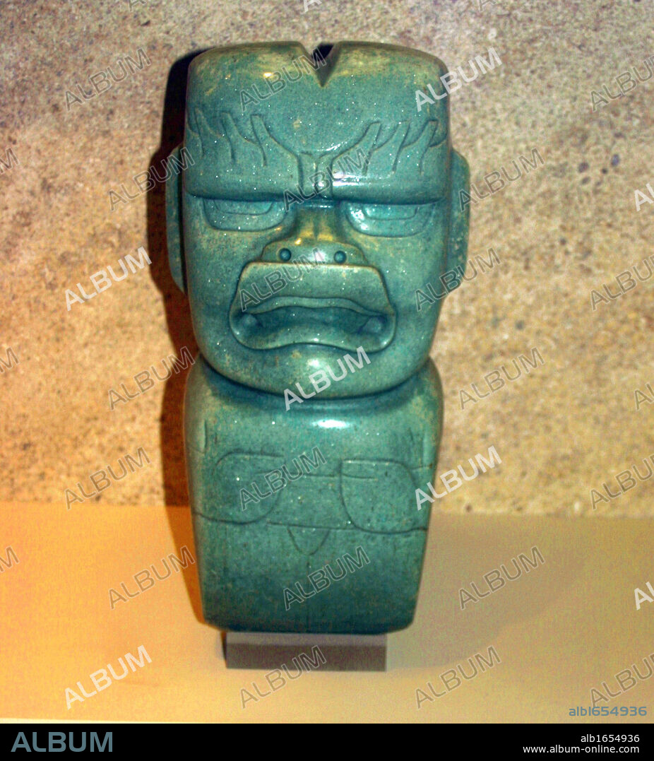 Jade votive axe: Olmec, 1200-400 BC. Mexico Mesoamerican Artefact Pre-Columbian.