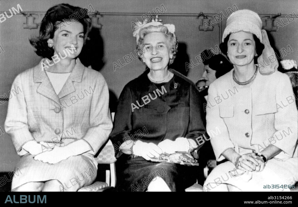 Washington, D.C.   May, 1962. Mrs. Jacqueline Kennedy, Mrs. Wallace Bennett of Utah, and Lady Bird johnson at a congressional wives luncheon.
