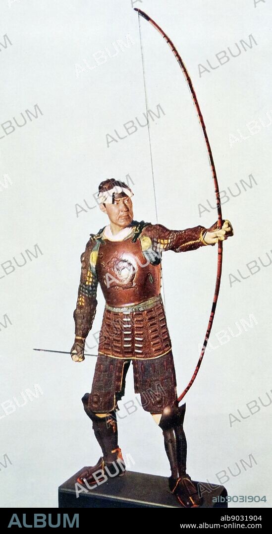 Model of a Japanese Samurai Warrior in full armour holding a Bow. Dated 19th Century.