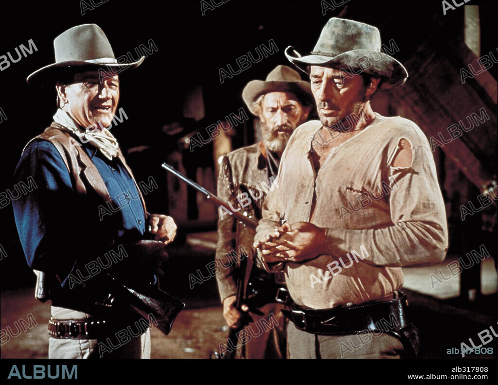 JOHN WAYNE und ROBERT MITCHUM in EL DORADO, 1966, unter der Regie von HOWARD HAWKS. Copyright PARAMOUNT PICTURES.