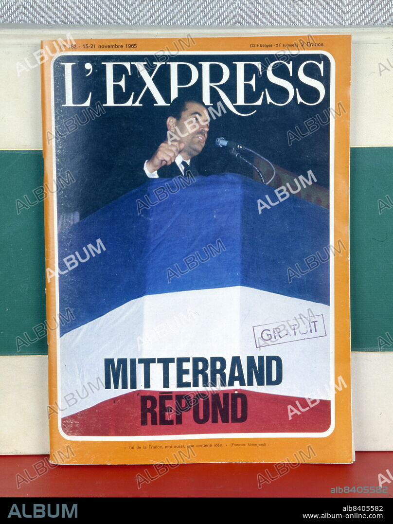 Coloured photograph of a man in a pulpit from the publication "L'Express". It's entitled "Mitterrand replies", dated 15-21 November 1965.