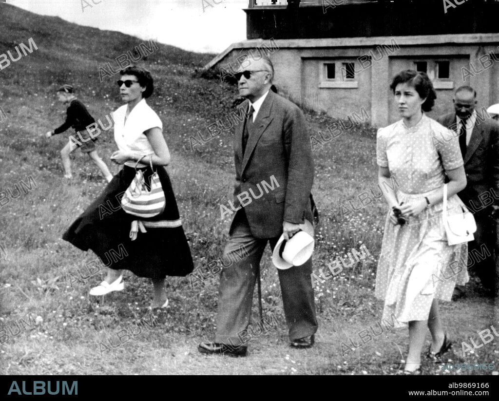 The Man At Muerren: Dr. Konrad Adenauer, the Federal Chancellor, takes the air at Muerren, Switzerland, July 20, with his daughter, Dr. Ria Reiners, left, and an unnamed woman secretary. He arrived at Muerren - only 87 miles from Geneva - July 18, the day the big four talks began. He is on a holiday. July 21, 1955. (Photo by Associated Press Photo).