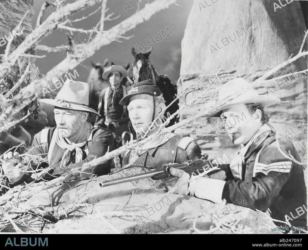 BEN JOHNSON, HARRY CAREY JR. and JOHN WAYNE in SHE WORE A YELLOW RIBBON, 1949, directed by JOHN FORD. Copyright RKO.