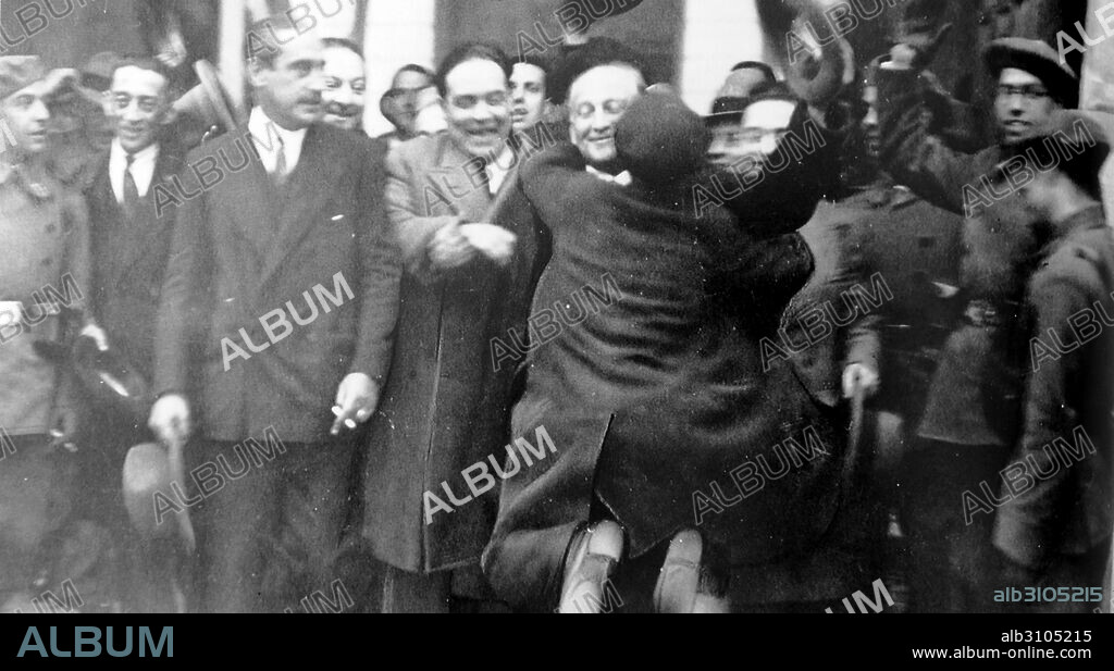 Miguel Maura Gamazo Centre with arm linked to Francisco Largo Caballero who is greeted by a supporter after the formation of the government in 1931. Francisco Largo Caballero (1869 – 1946), Spanish politician and trade unionist. He was one of the historic leaders of the Spanish Socialist Workers' Party (PSOE) and of the Workers' General Union (UGT). He was Minister of Labour Relations between 1931 and 1933. Miguel Maura Gamazo (1887 — 1971) Spanish politician of the Restoration and the Second Republic, became minister of the Interior in Zamora's provisional government.