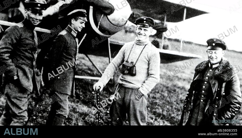 The Red baron with unidentified officers. Manfred Albrecht Freiherr von Richthofen (May 2, 1892 - April 21, 1918) was a WWI German flying ace with the Imperial German Army Air Service (LuftstreitkrÃ¤fte). Originally a cavalryman, he transferred to the Air Service in 1915, becoming one of the first members of Jasta 2 in 1916. He quickly distinguished himself as a fighter pilot, and during 1917 became leader of Jasta 11 and then the larger unit Jagdgeschwader 1 (Flying Circus). By 1918, he was regarded as a national hero in Germany, and was very well known by the other side. He was a notable tactician and squadron leader and a fine marksman. Typically, he would dive from above to attack with the advantage of the sun behind him, with other Jasta pilots covering his rear and flanks. It was his Albatros D.III that was first painted bright red, in late January 1917, and in which he first earned his name and reputation. Richthofen was shot down and killed near Amiens on April 21, 1918. There has been considerable discussion and debate regarding aspects of his career, especially the circumstances of his death. He is considered the top ace of that war, being officially credited with 80 air combat victories. He remains perhaps the most widely known fighter pilot of all time, and has been the subject of many books, films and other media.