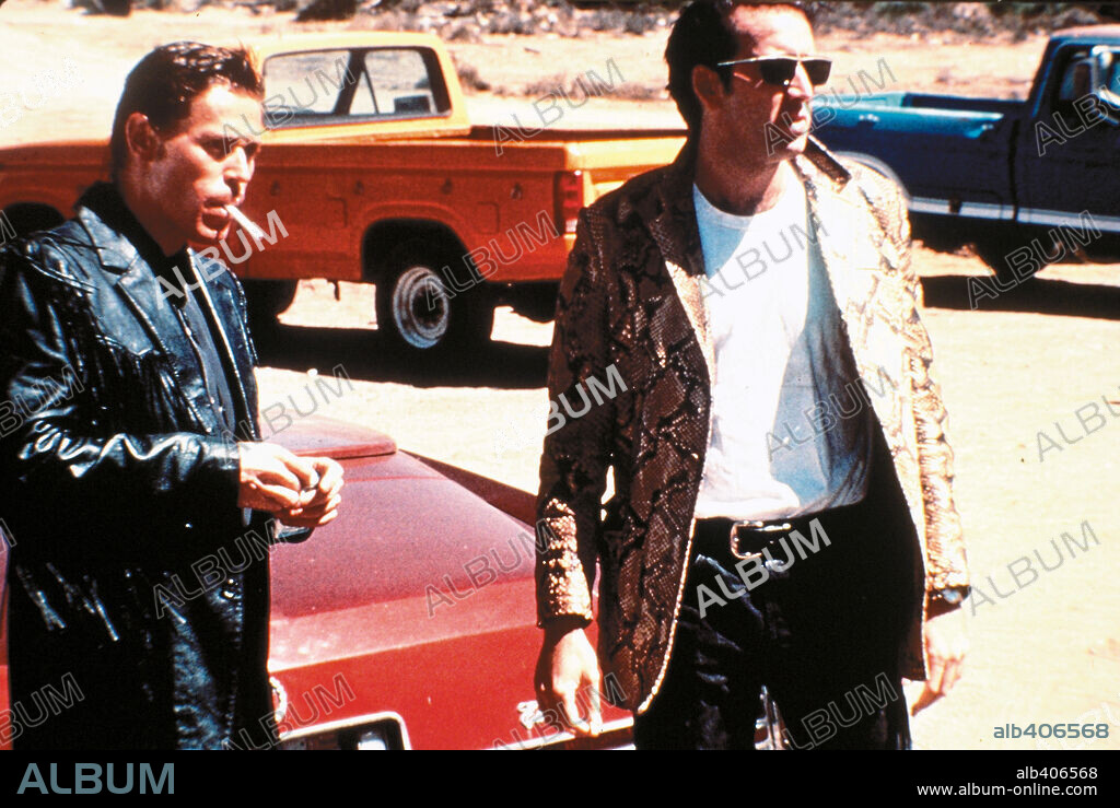 NICOLAS CAGE and WILLEM DAFOE in WILD AT HEART, 1990, directed by DAVID LYNCH. Copyright PolyGram Filmed Entertainment/Propaganda Films.