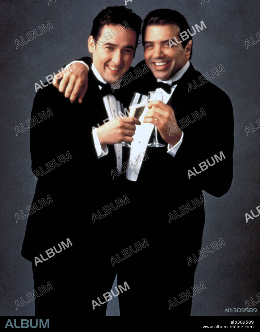 CHAZZ PALMINTERI and JOHN CUSACK in BULLETS OVER BROADWAY, 1994, directed by WOODY ALLEN. Copyright MIRAMAX FILMS/SWEETLAND FILMS.