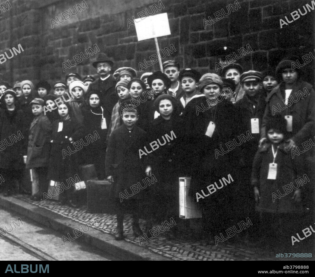 The Lawrence Textile Strike was a strike of immigrant workers in Lawrence, Massachusetts in 1912 led by the Industrial Workers of the World. Prompted by one mill owner's decision to lower wages when a new law shortening the workweek went into effect in January, the strike spread rapidly through the town, growing to more than twenty thousand workers at nearly every mill within a week. The strikers' children were brought to New York and other cities, where they were cared for relieving their parents worry and need to provide for them. It was excellent publicity for the strikers. The strike, which lasted more than two months and which defied the assumptions of conservative trade unions within the American Federation of Labor that immigrant, largely female and ethnically divided workers could not be organized, was successful. Within a year, however, the union had largely collapsed and most of the gains achieved by the workers were lost. The Lawrence strike is often referred to as the "Bread and Roses" strike, or, "The Strike for Three Loaves".