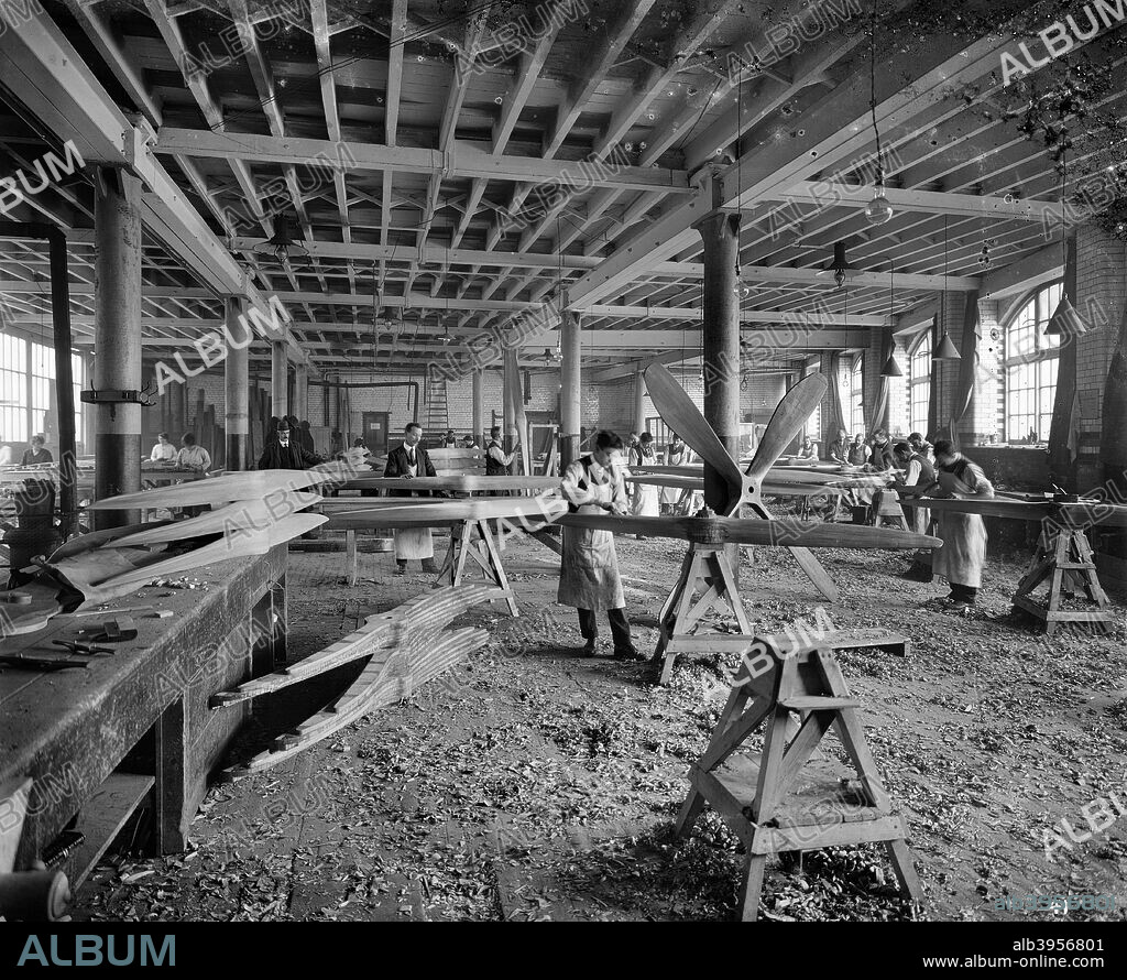 Aircraft manufacturing, Hampton & Sons Ltd works, 43 Belvedere Road, Lambeth, London, July 1916. Workers manufacturing aircraft propellers in Hampton & Sons Ltd munition works. One of a series of photographs of Hampton & Sons, furniture and furnishing manufacturers, who converted to war production.