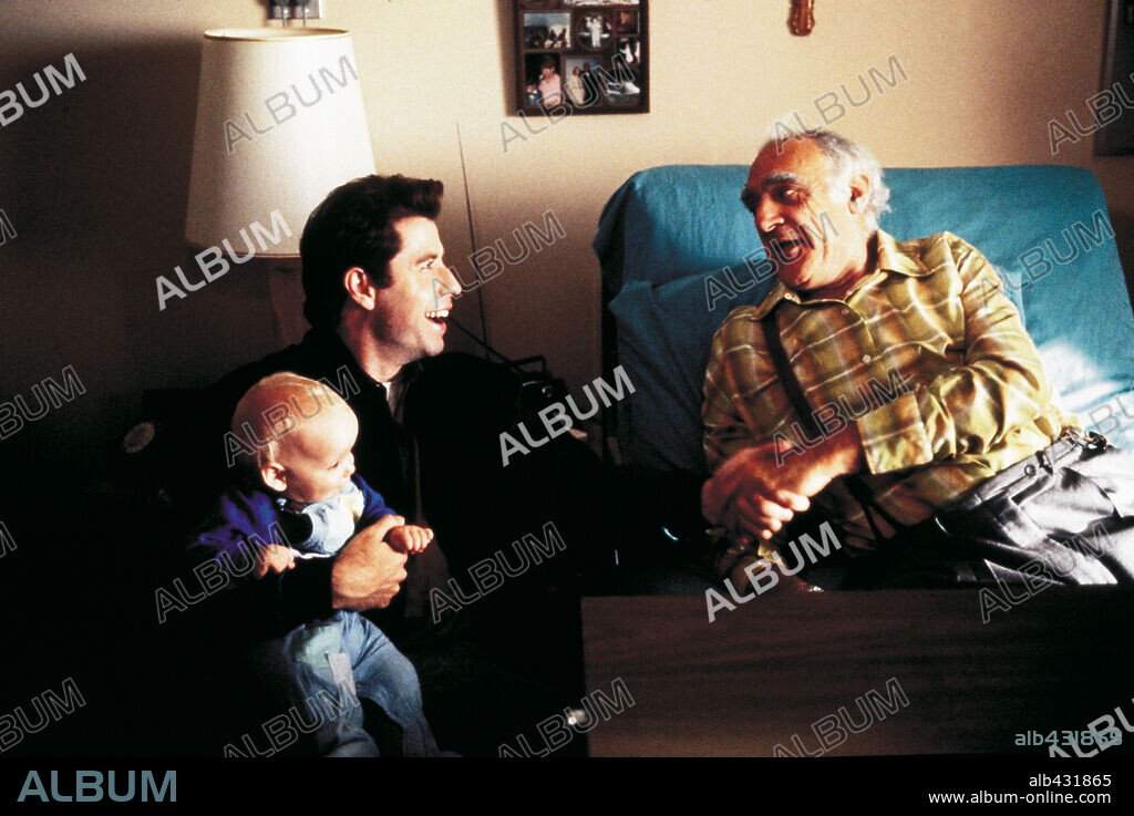 JOHN TRAVOLTA en MIRA QUIÉN HABLA, 1989 (LOOK WHO'S TALKING), dirigida por AMY HECKERLING. Copyright TRI STAR PICTURES.