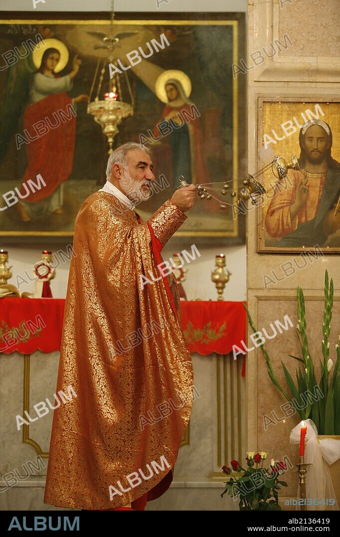Melkite priest Emile Shoufani celebrating mass in Nazareth.