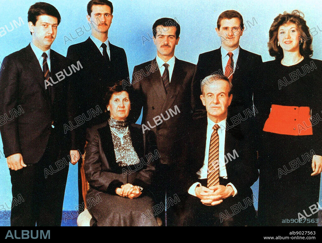 The Assad family circa 1992. Front row; Hafez al-Assad, his wife, Anisa Makhlouf. Rear; left to right: Maher, Bashar, Bassel, Majid, and Bushra al-Assad.
