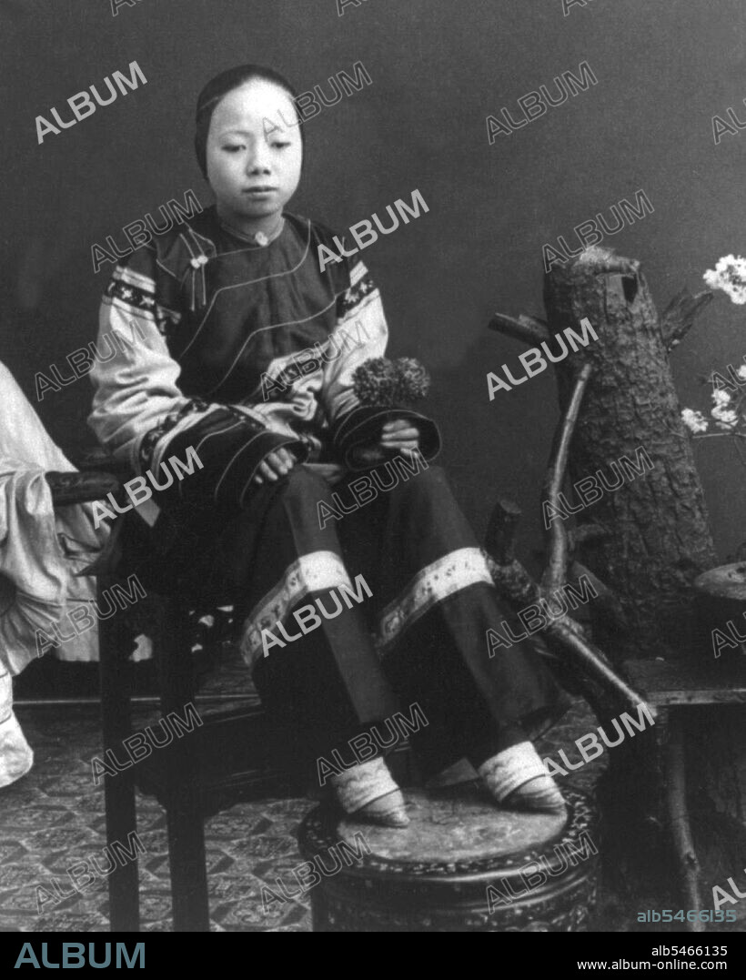 Foot binding (pinyin: chanzu, literally 'bound feet') was a custom practiced on young girls and women for approximately one thousand years in China, beginning in the 10th century and ending in the first half of 20th century. There is little evidence for the custom prior to the court of the Southern Tang dynasty in Nanjing, which celebrated the fame of its dancing girls, renowned for their tiny feet and beautiful bow shoes. What is clear is that foot binding was first practised among the elite and only in the wealthiest parts of China, which suggests that binding the feet of well-born girls represented their freedom from manual labor and, at the same time, the ability of their husbands to afford wives who did not need to work, who existed solely to serve their men and direct household servants while performing no labor themselves. Bound feet were considered intensely erotic in traditional Chinese culture. Qing Dynasty sex manuals listed 48 different ways of playing with women's bound feet. Some men preferred never to see a woman's bound feet, so they were always concealed within tiny 'lotus shoes' and wrappings. Feng Xun is recorded as stating, 'If you remove the shoes and bindings, the aesthetic feeling will be destroyed forever' - an indication that men understood that the symbolic erotic fantasy of bound feet did not correspond to its unpleasant physical reality, which was therefore to be kept hidden. For men, the primary erotic effect was a function of the lotus gait, the tiny steps and swaying walk of a woman whose feet had been bound.
