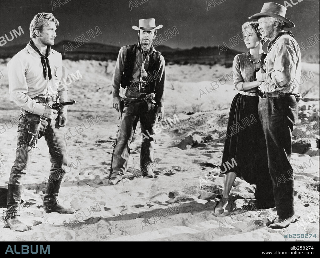 KIRK DOUGLAS, VIRGINIA MAYO and WALTER BRENNAN in THE TRAVELERS, 1951 (ALONG THE GREAT DIVIDE), directed by RAOUL WALSH. Copyright WARNER BROTHERS.