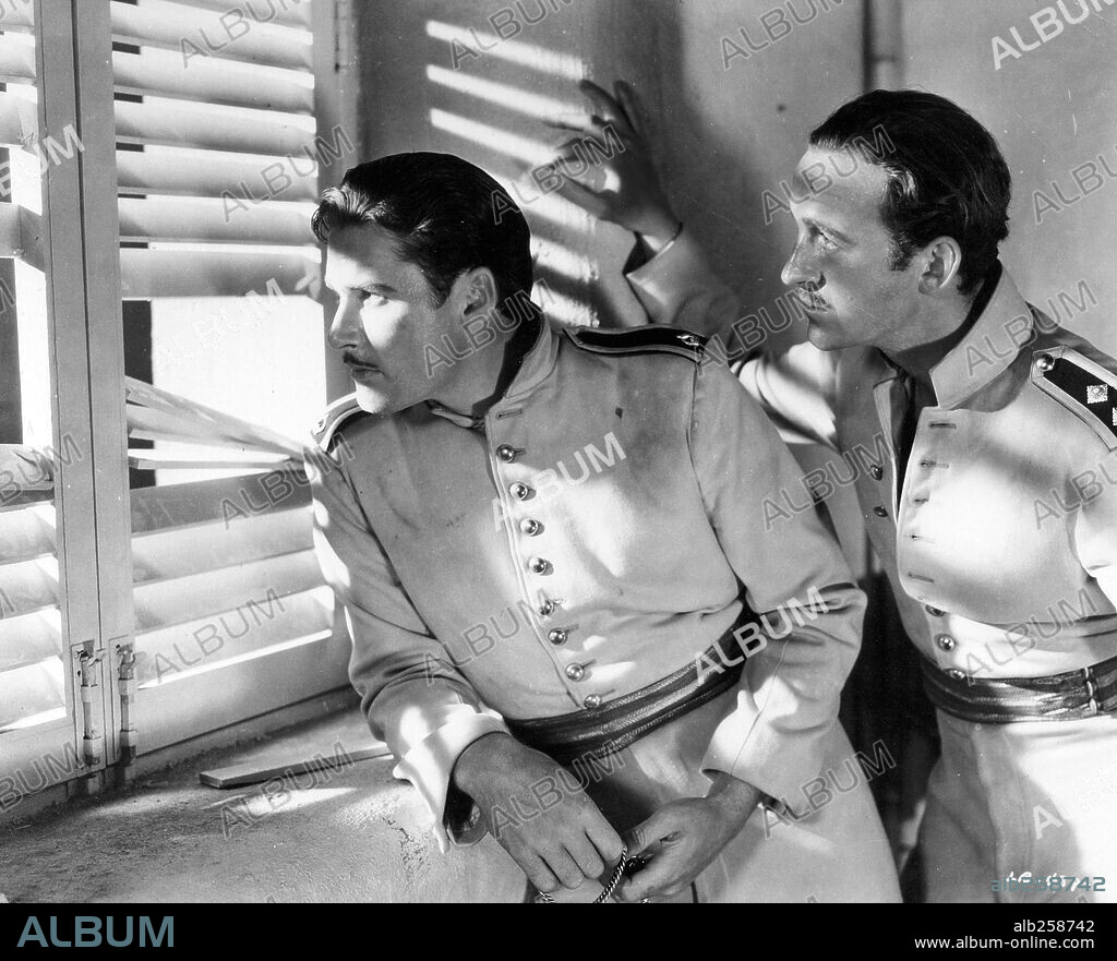 DAVID NIVEN and ERROL FLYNN in THE CHARGE OF THE LIGHT BRIGADE, 1936, directed by MICHAEL CURTIZ. Copyright WARNER BROTHERS.