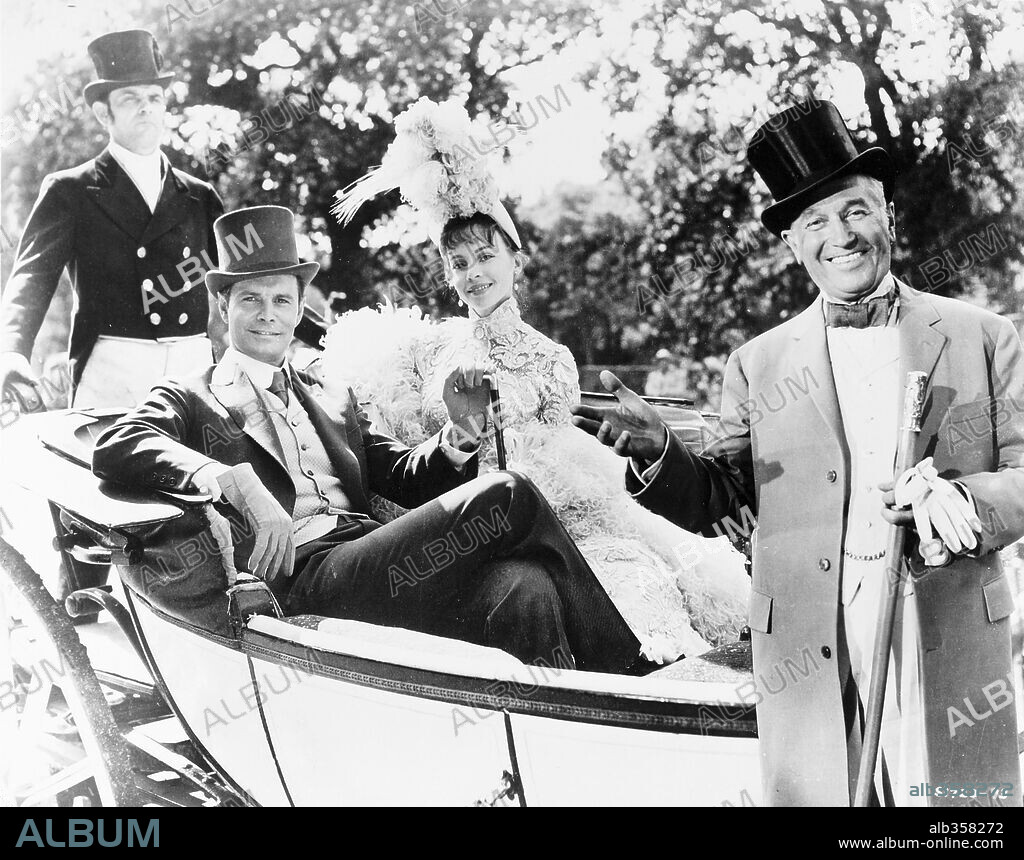 LESLIE CARON, LOUIS JOURDAN and MAURICE CHEVALIER in GIGI, 1958, directed by VINCENTE MINNELLI. Copyright M.G.M.