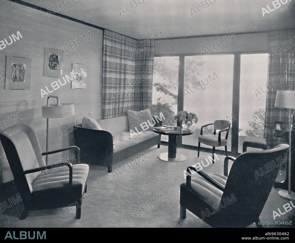 KAUFMAN & FABRY CO. 'The living-room of a house designed by Howard T. Fisher for Miss Ruth Page, Hubbard Woods, Illinois, and executed by General Houses Inc., Chicago', 1935. From Decorative Art 1935 - Year-Book of The Studio, by C.G. Holme. [The Studio Limited, London, 1935].