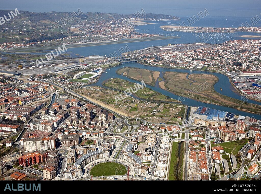 Irun (in foreground), San Sebastian airport and Hondarribia (in background), Hendaye (centre, right), Bidasoa river mouth, Txingudi Bay, Spanish-French border.
