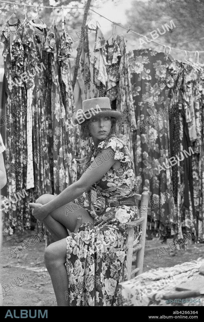 Woman in hippy market in Es Canar, Ibiza, 70s.