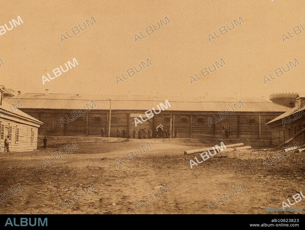 INNOKENTY IGNATIEVICH PAVLOVSKY. Korsakov Prison for Exiled Convicts in Southern Sakhalin, 1880-1899. From an album created on Sakhalin Island in the 1890s. Sakhalin was used by imperial Russia as a penal colony and place of exile for criminals and political prisoners. Between 1869 and 1906, more than 30,000 inmates and exiles endured the harsh conditions of the forced-labor colony on the island. The album contains photographs that provide rare glimpses of Sakhalin's settlements and prisons and the prisoners, exiles, and guards who inhabited the island.  Anton Chekhov, the Russian writer and medical doctor, spent three months on Sakhalin in 1890, where he extensively researched the plight of the prisoners and the native population. The publication of his Sakhalin Island in 1895 highlighted the depravity of the situation in this remote corner of Russia and led to public protests that helped bring about the closure of the penal colony. National Library of Russia.