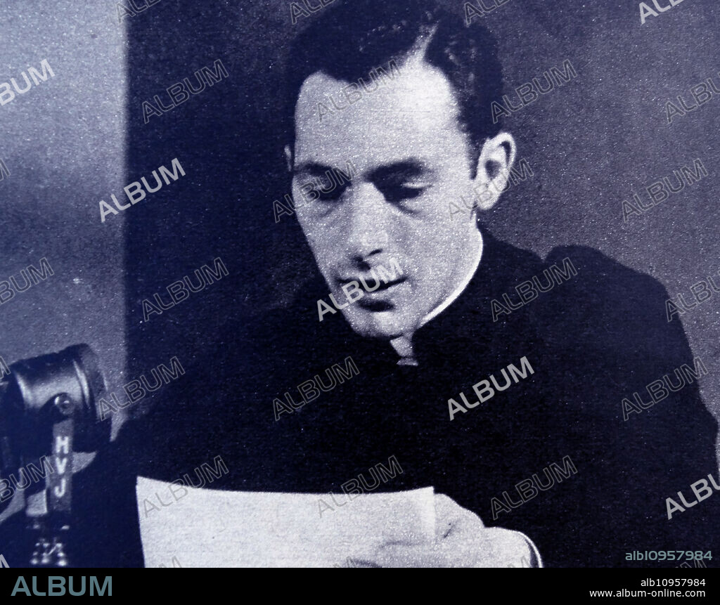 Priest broadcasting a religious message to millions on a Marconi short-wave radio from the Vatican City.