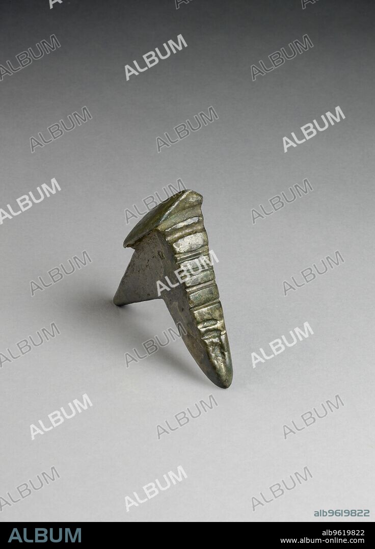 Anvil, Bronze Age, c2000-600BC. Bronze swage anvil, yellow patina. Dimensions: length: 7.5 cmwidth: 3.6 cmheight: 8.4 cm.