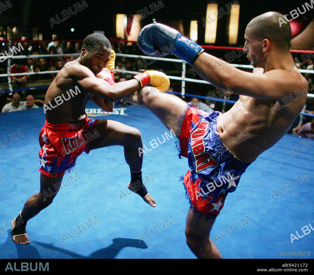 Jun 16, 2009 - New York, New York, USA - Five Points Academy, Mayhem XIV, Muay Thai kickboxing at BB King Blues Club. Fighters score points with punches and strikes with the shins, knees, and feet. PICTURED: BRANDON MICKENS, left, and OMAR AHMED. (Credit Image: © John Marshall Mantel/John Mantel/ZUMA Press).
