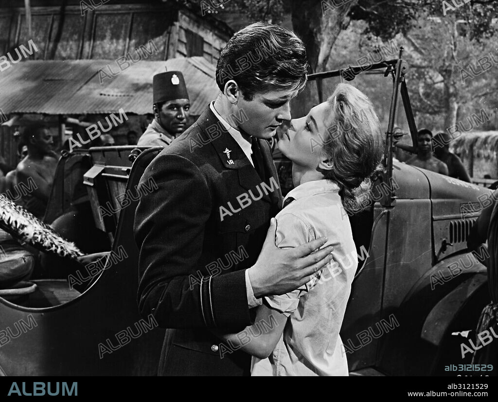 ANGIE DICKINSON and ROGER MOORE in THE SINS OF RACHEL CADE, 1961, directed by GORDON DOUGLAS. Copyright WARNER BROTHERS.