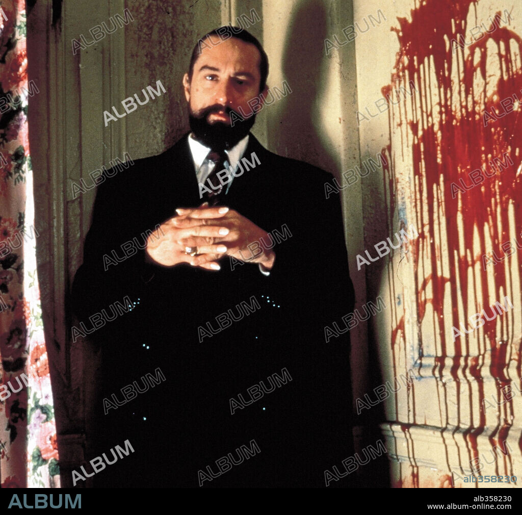 ROBERT DE NIRO dans ANGEL HEART - AUX PORTES DE L'ENFER, 1987 (ANGEL HEART), réalisé par ALAN PARKER. Copyright UNION FILMS/CAROLCO INT/TRI STAR.