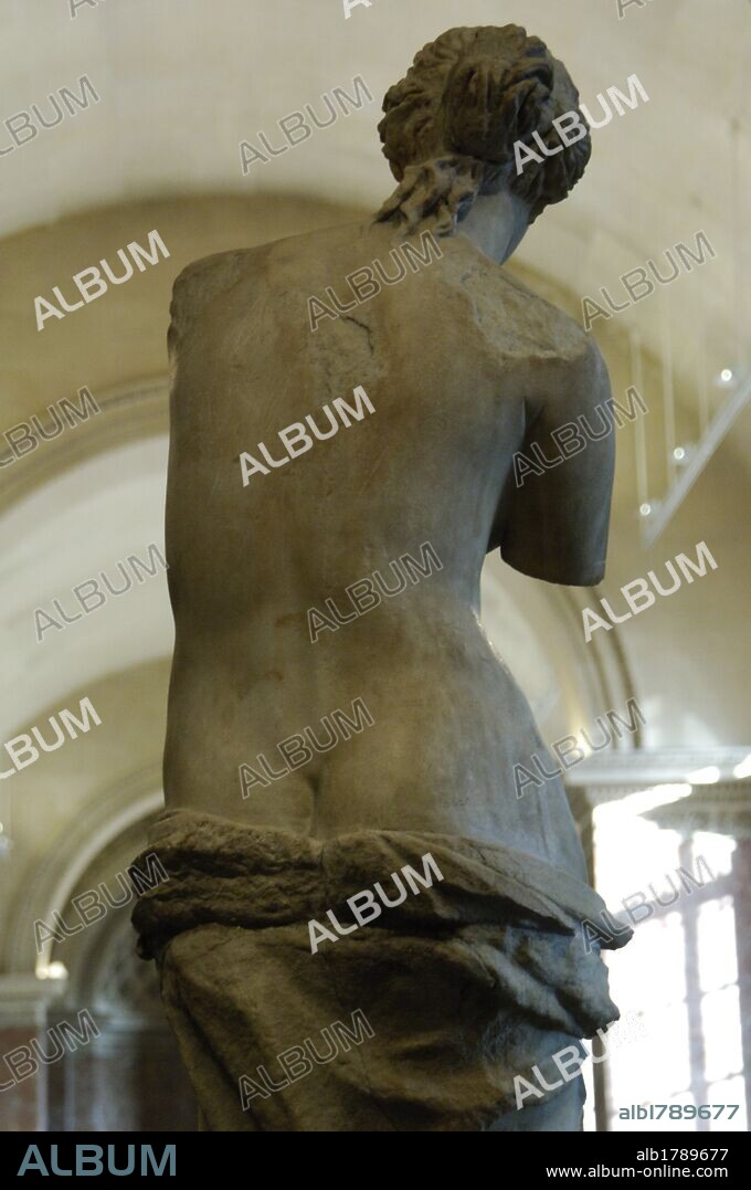 Greek Art. Statue of Aphrodite of Milos, known as the Venus de Milo (130-100 B.C.) by Alexandros of Antioch. Marble. It is believed to depict the Greek goddess of love and beauty, Aphrodite. Back view. Louvre Museum. Paris. France.