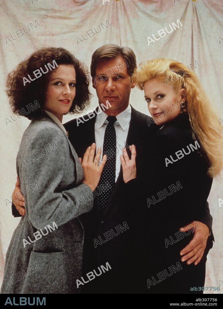 HARRISON FORD, MELANIE GRIFFITH and SIGOURNEY WEAVER in WORKING GIRL, 1988, directed by MIKE NICHOLS. Copyright 20TH CENTURY FOX.