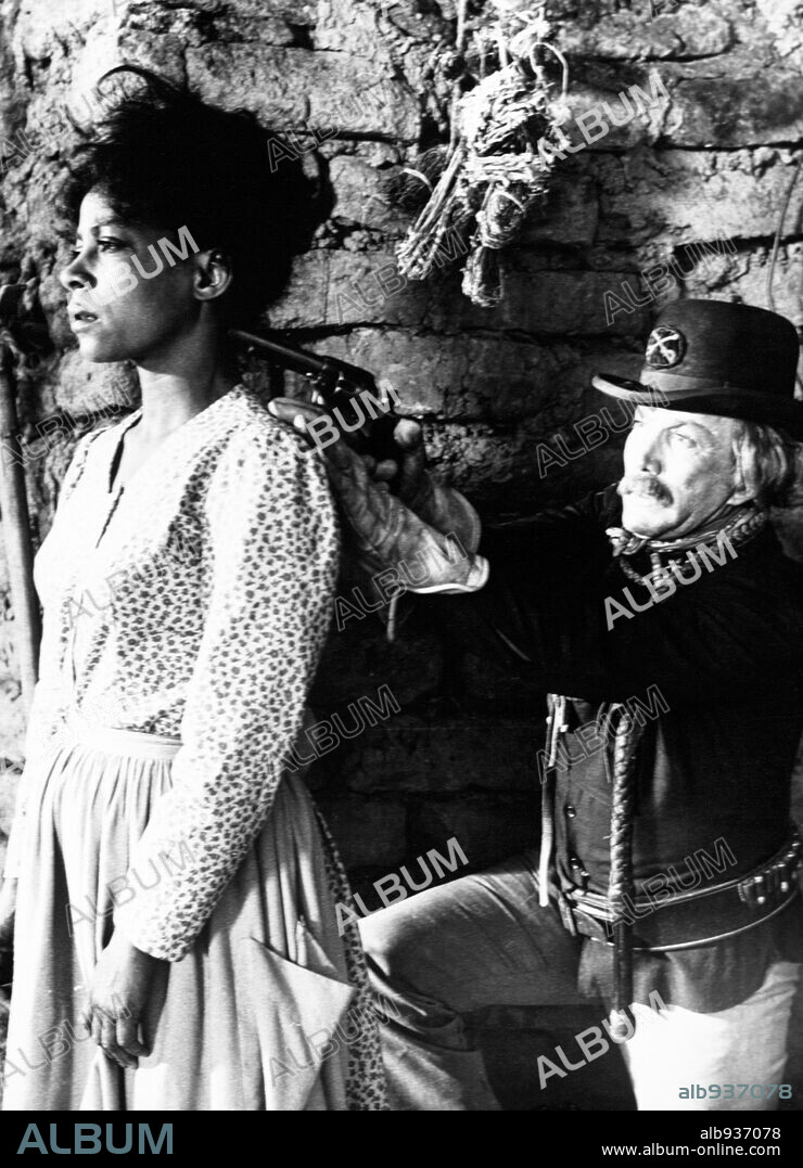 CAMERON MITCHELL and RUBY DEE in BUCK AND THE PREACHER, 1972, directed by SIDNEY POITIER. Copyright COLUMBIA PICTURES.