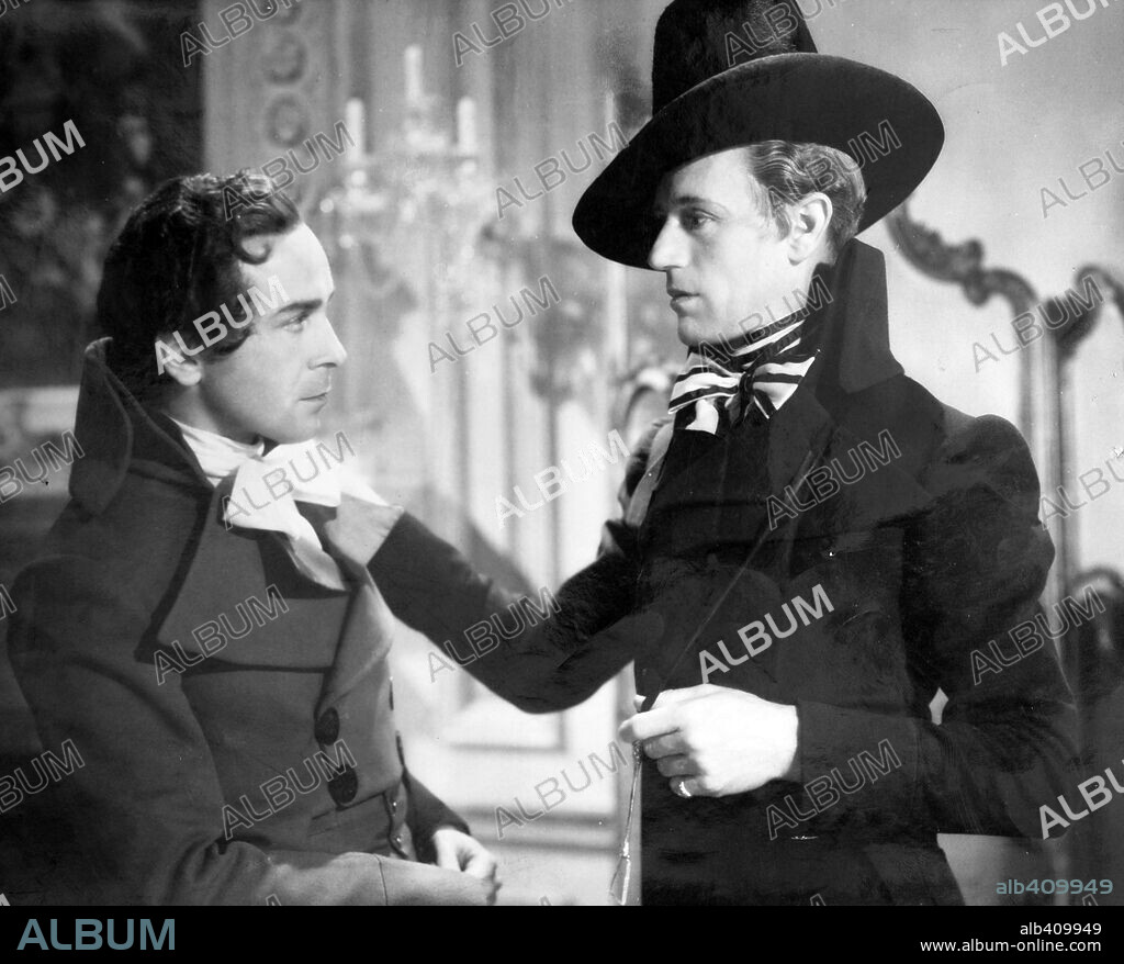 LESLIE HOWARD and WALTER RILLA in THE SCARLET PIMPERNEL, 1934, directed by HAROLD YOUNG. Copyright LONDON FILMS/UNITED ARTISTS.