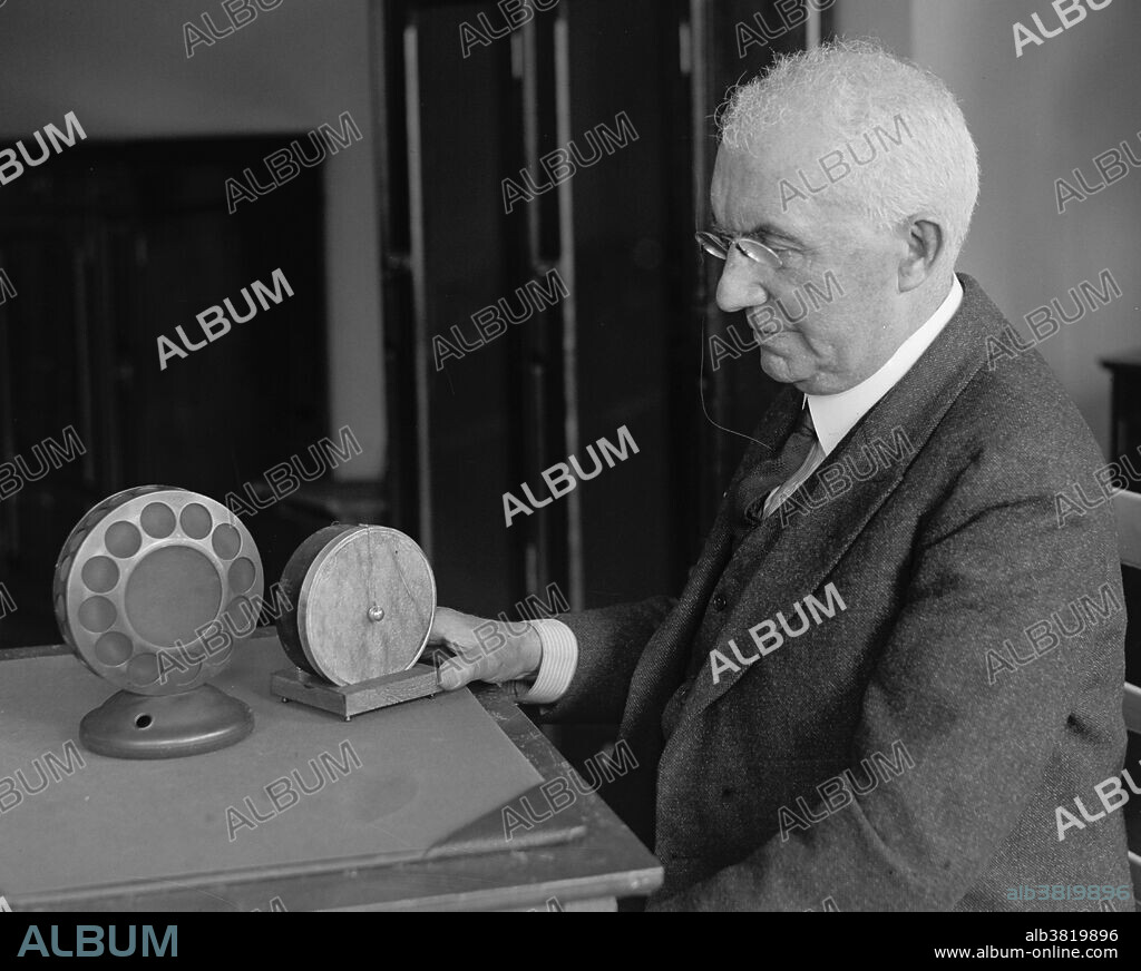 Berliner, with the model of the telephone transmitter (one of the first type of microphones) he invented, 1927. Emile Berliner (May 20, 1851 - August 3, 1929) was a German-born American inventor. In 1886 Berliner began experimenting with methods of sound recording. He was granted his first patent for what he called the "gramophone" in 1887. The first gramophones recorded sound using horizontal modulation on a cylinder coated with a low resistance material such as lamp black, subsequently fixed with varnish and then copied by photoengraving on a metal playback cylinder. This was similar to the method employed by Edison's machines. In 1888 Berliner invented a simpler way to record sound by using discs. Berliner's other inventions include a new type of loom for mass-production of cloth; an acoustic tile; and an early version of the helicopter through the development of a light-weight rotary engine. Berliner, who suffered a nervous breakdown in 1914, was also active in advocating improvements in public health and sanitation. He died of a heart attack in 1929 at the age of 78.